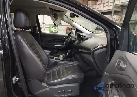 2017 Ford Escape Titanium z USA, uszkodzony, nr VIN 1FMCU9JD9HUC40929